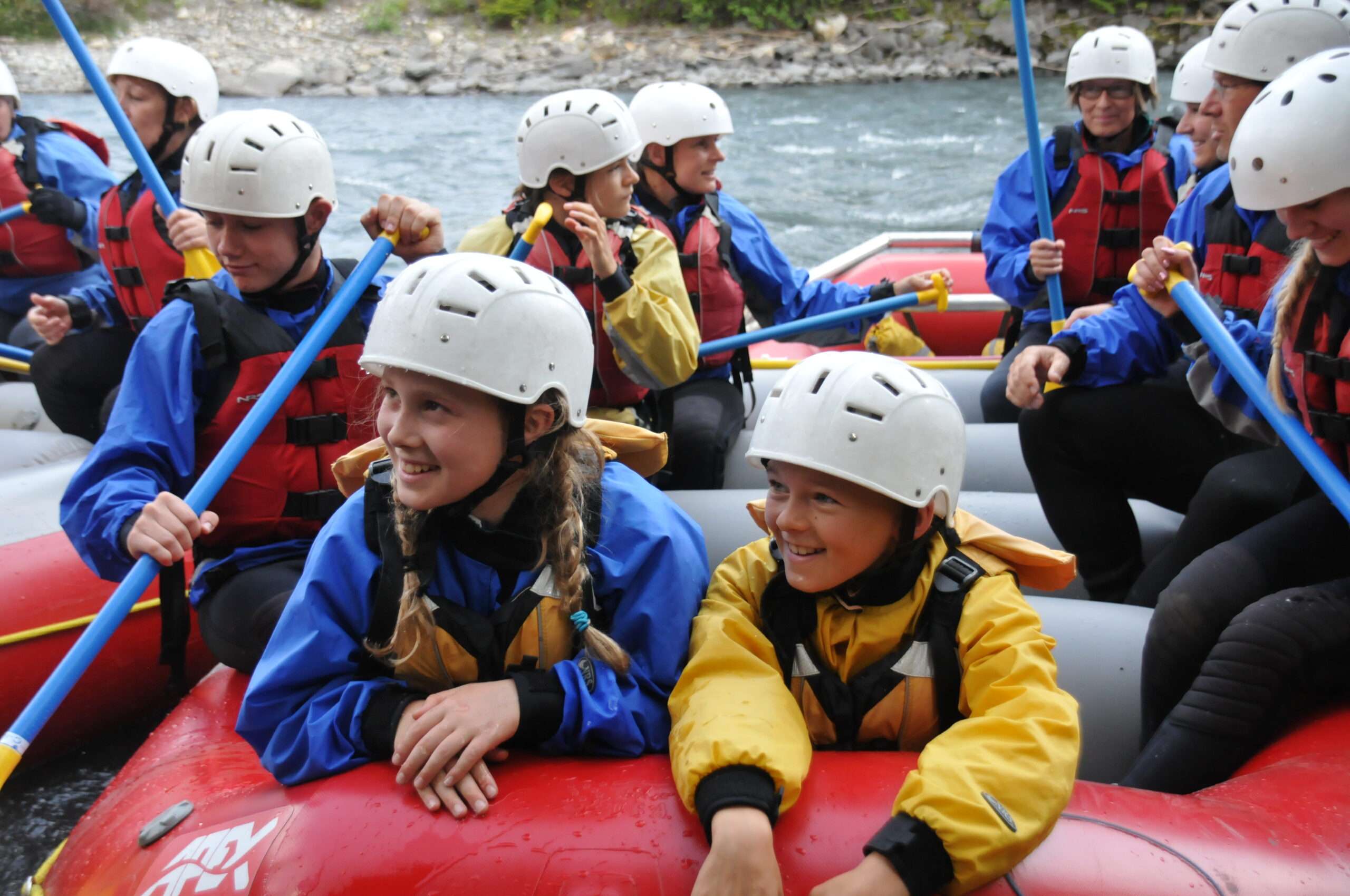 Family whitewater trip, everyone grinning